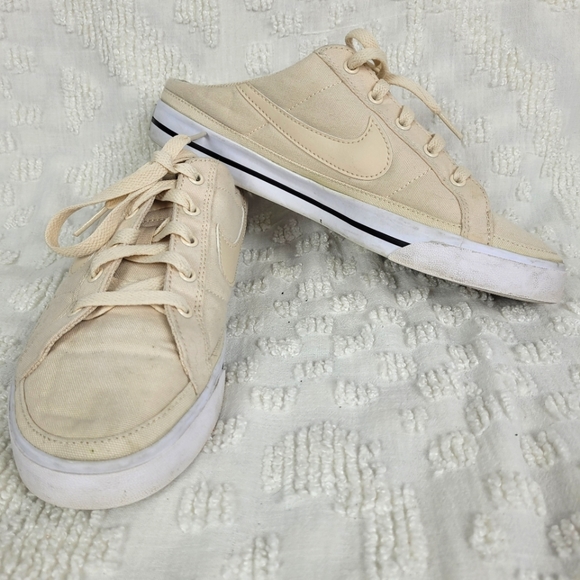 Nike Shoes - Nike ivory canvas mules 9